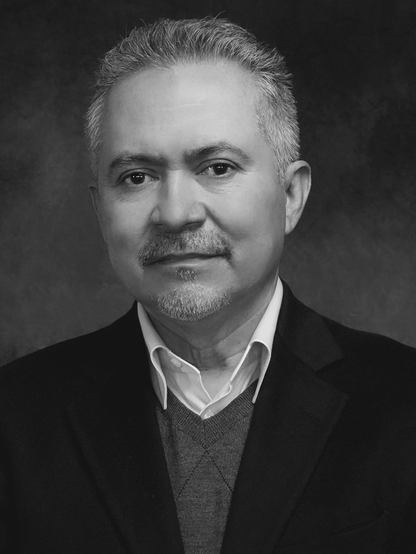 headshot of Oscar Chacón