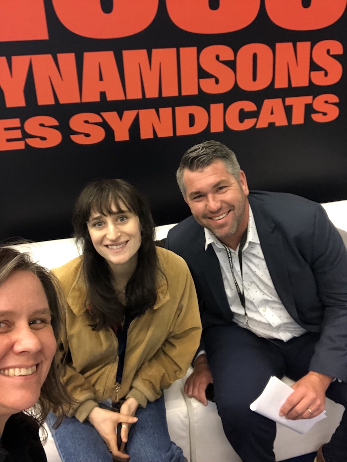 Martha Grant, Director of Product Strategy at Action Network & Action Builder, poses with Sarah Beth Ryther of Trader Joe's United and Josh Thole of Major League Baseball Players Association at the Canadian Labour Congress Convention in Montreal.
