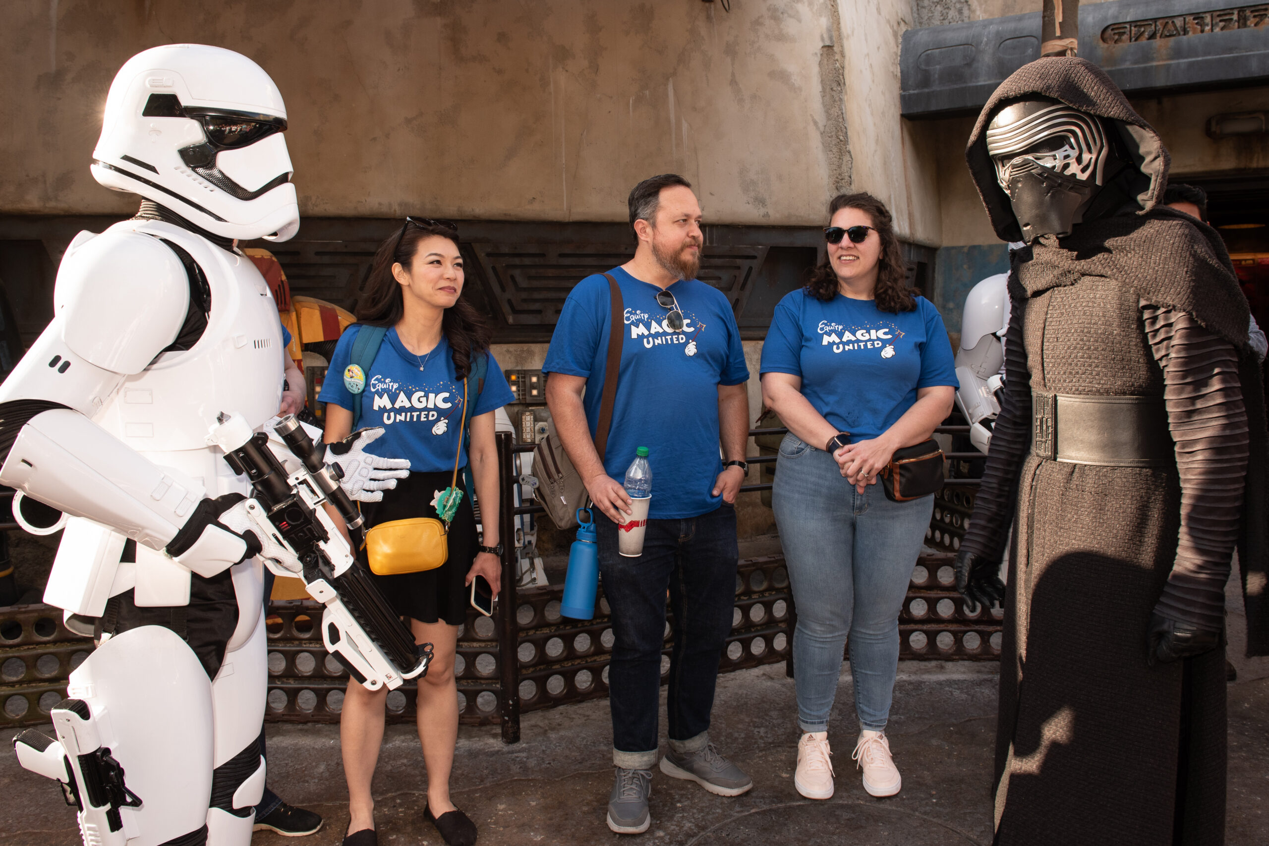 Cast Members of Magic United pictured in Magic United shirts and Star Wars costumes.